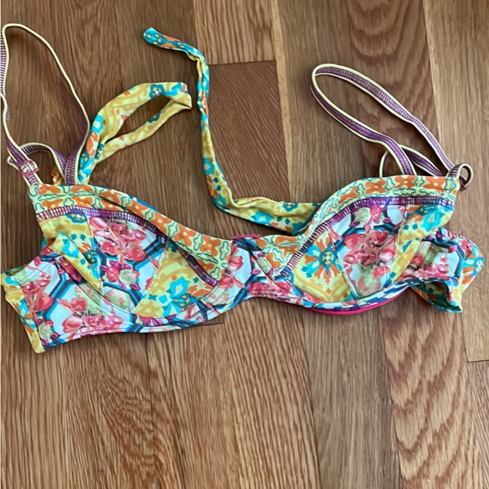Maaji size M ( but feels more like a size small) swim top.